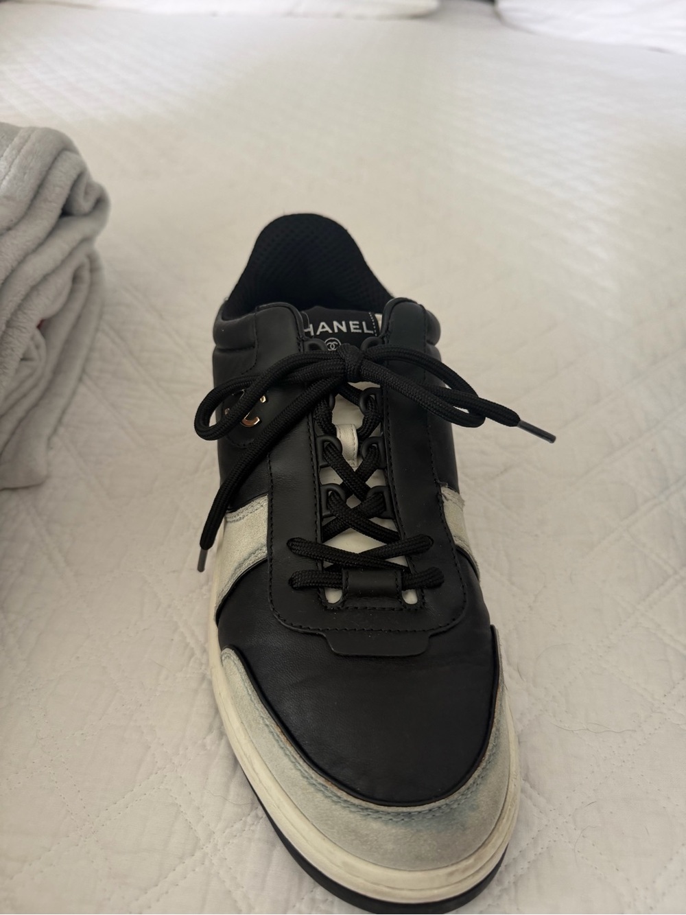 CHANEL Black and White Leather Lace-Up Sneaker